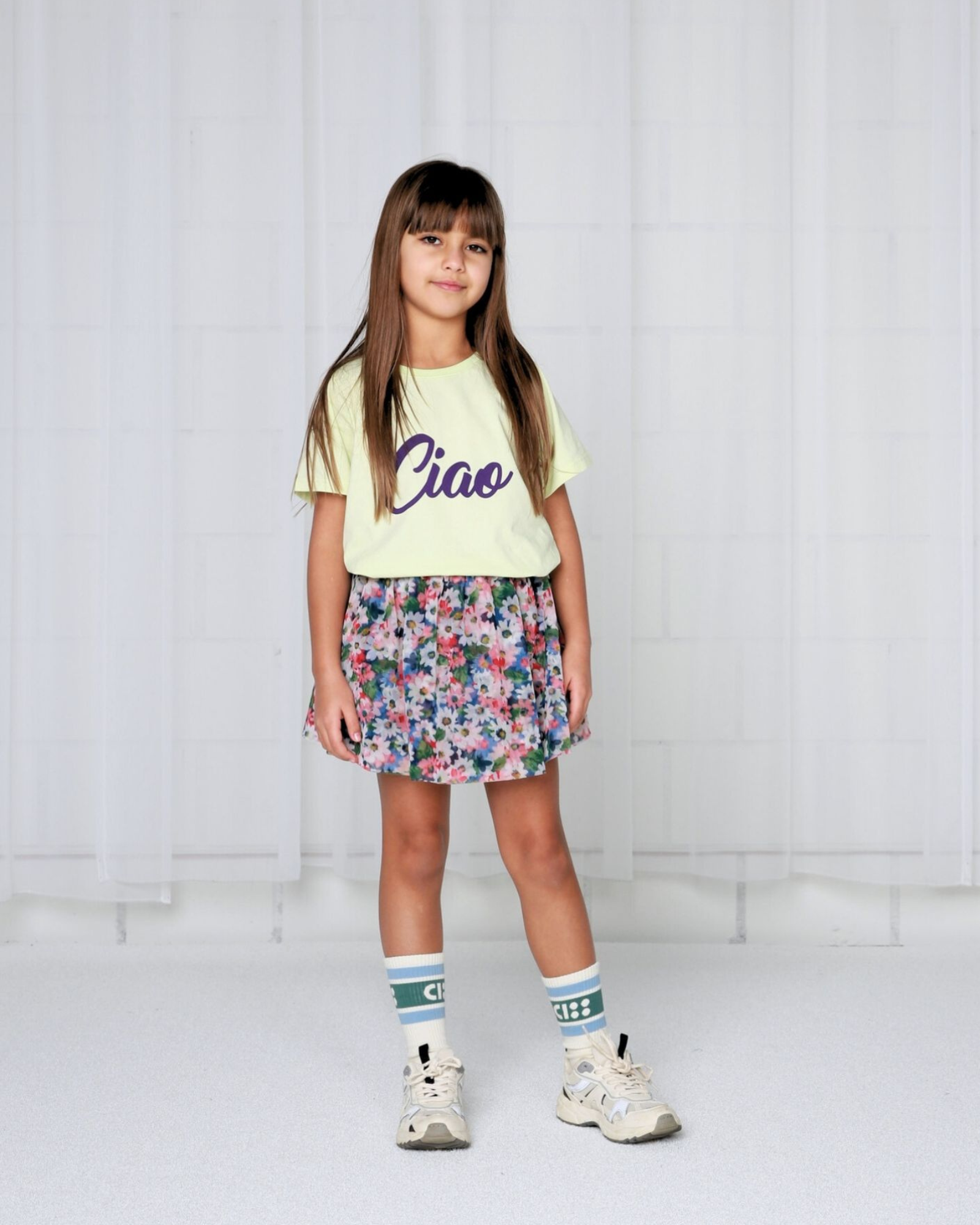 Girl model wearing Socks Logo with the Ciao Bye T-Shirt.