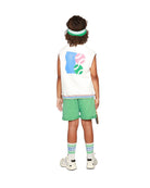 Boy model wearing the Tennis Debardeur with Jog Shorts in Spruce Green, Socks Ciss in White and the Headband Happy Human in Blue Green.