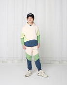 Boy model wearing the Color Block Hoodie and the Color Block Jog Pants.