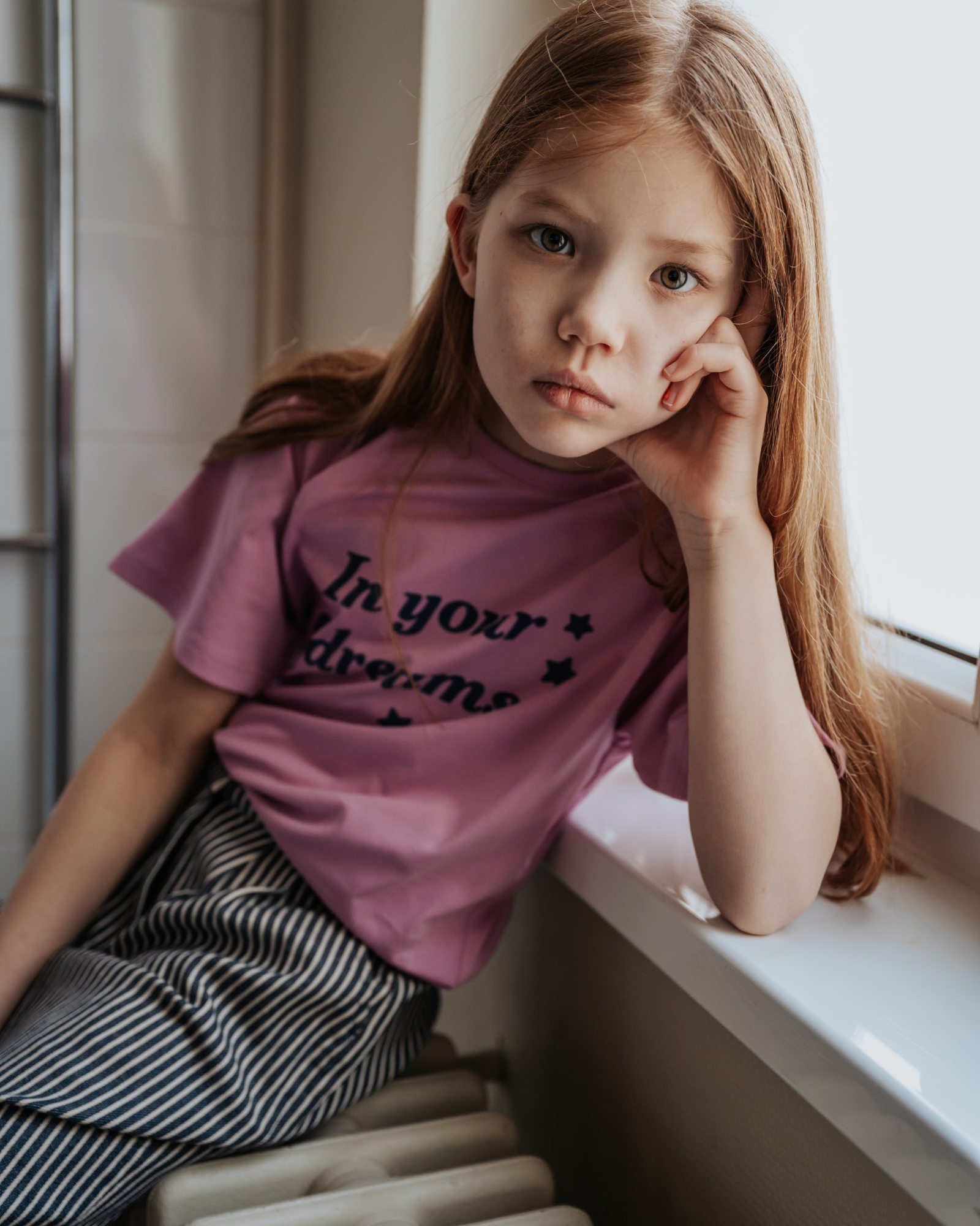 Girl model wearing the In Your Dreams T-Shirt in the colour Violet.