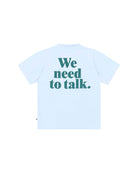 Unisex T-Shirt by Cos I Said So in high quality Organic Cotton. T-Shirt, that comes in Arctic Ice, a light blue, has a big caption We Need To Talk in dark green on the back.