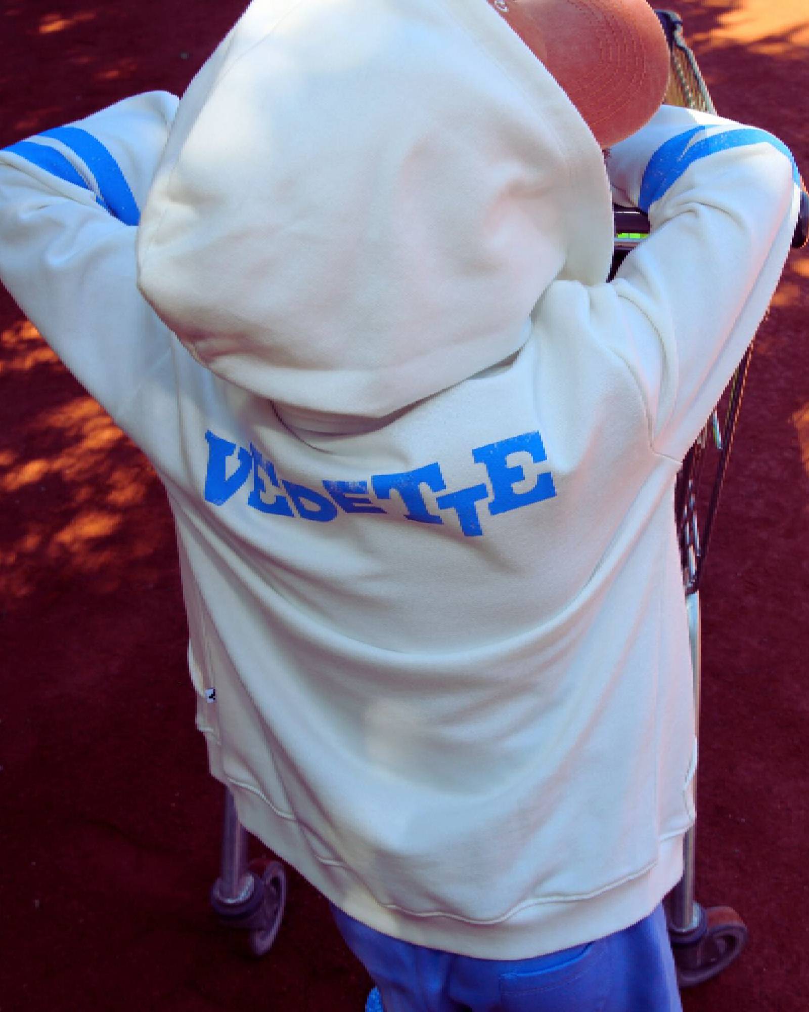 Boy model wearing the Zip Hoodie and the Jog Shorts in Granada Sky.