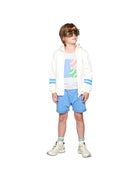 Boy model wearing Tennis Tank Top with  the Zip Hoodie Vedette and Jog Shorts in Granada Sky. 