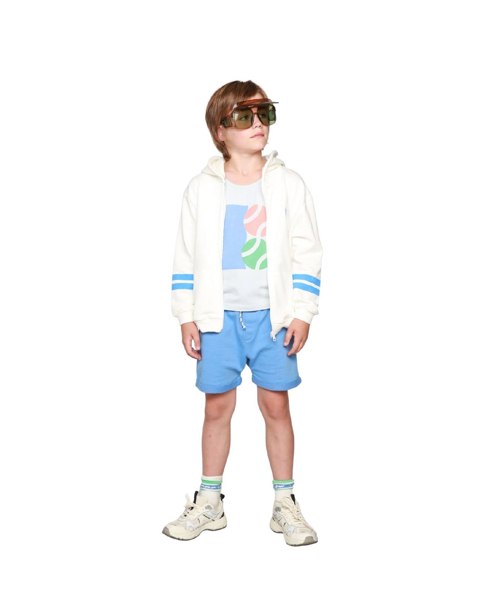 Boy model wearing Jog Shorts in Granada Sky with Tank Top Tennis and Zip Hoodie Vedette.